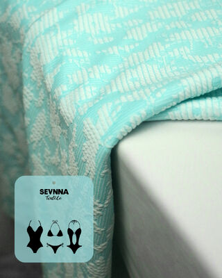 Vải bơi có kết cấu cao cấp với 135cm chiều rộng 195gsm trọng lượng và 50% thành phần polyester tái chế